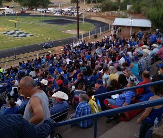 Families all together reunited for a football game.
