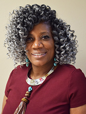 A photo of Michelle Sims, Secretary.