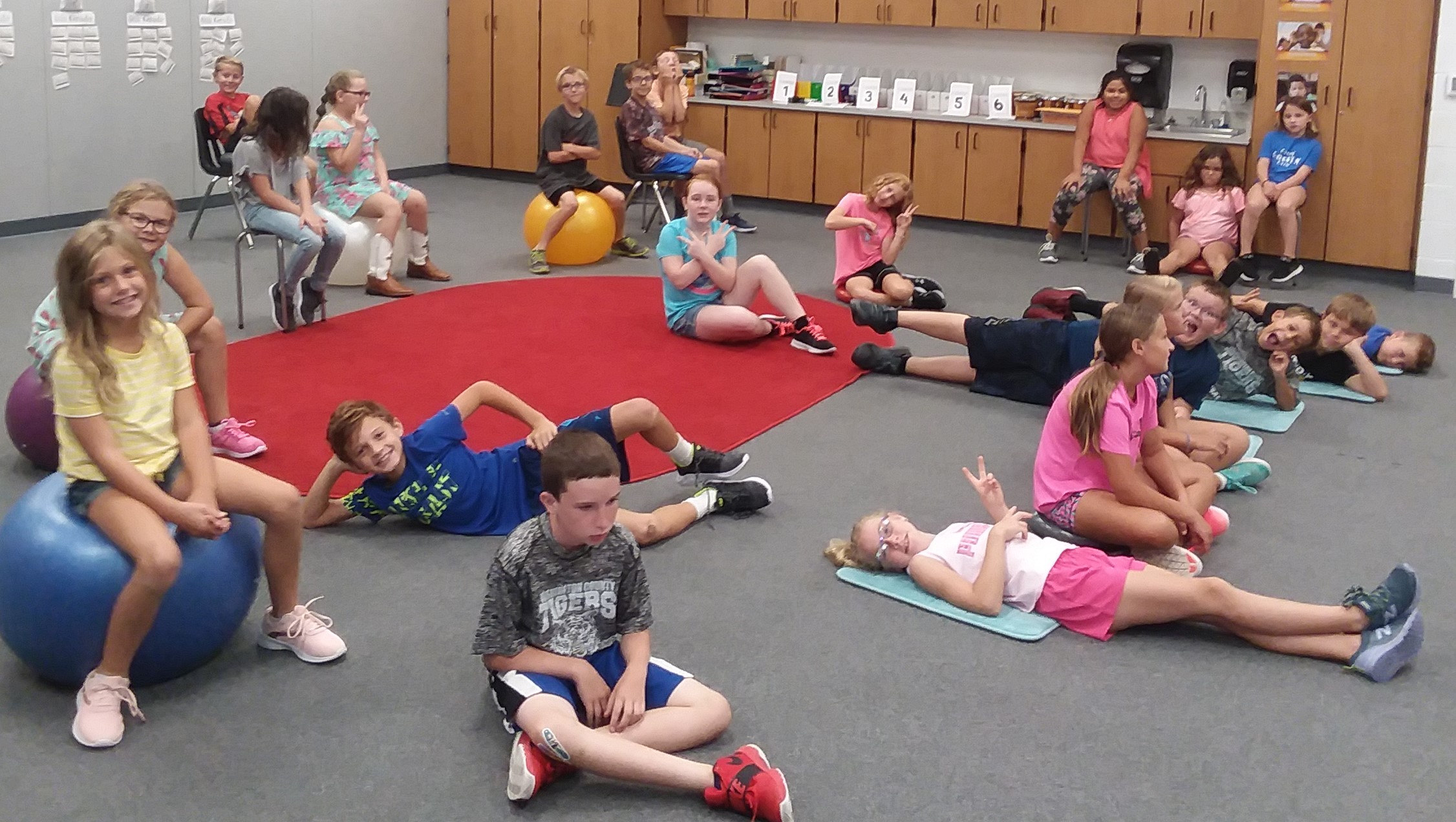 The same group of students paying attention in class.