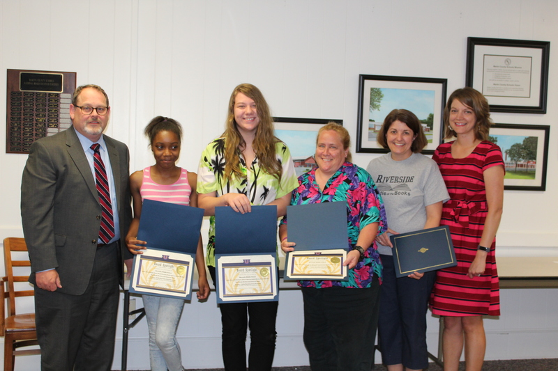 Riverside Middle School's 1st Place Battle of the Books Team Winners: Natalie Davis, Kym'Nasjia McClure and Coaches: Lisa Baumann and Kathy Manning. Not present: Kylie Stone, Shanai Benson, Daniel Moore, Ariana Modlin and Cornecia Smith