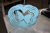 A light blue Butterfly Wind Spinner