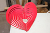 A red Heart Wind Spinner