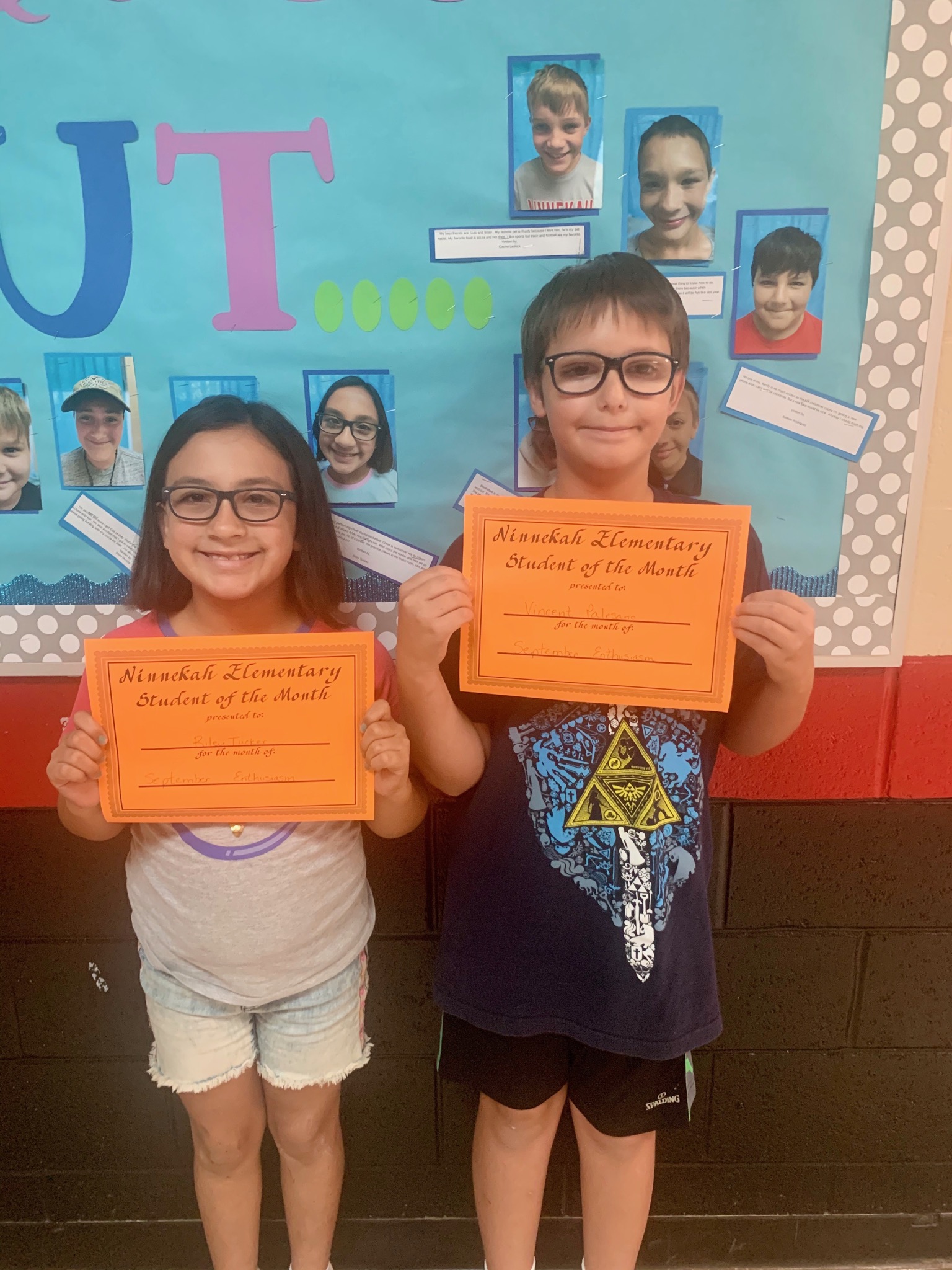 Kids with diplomas