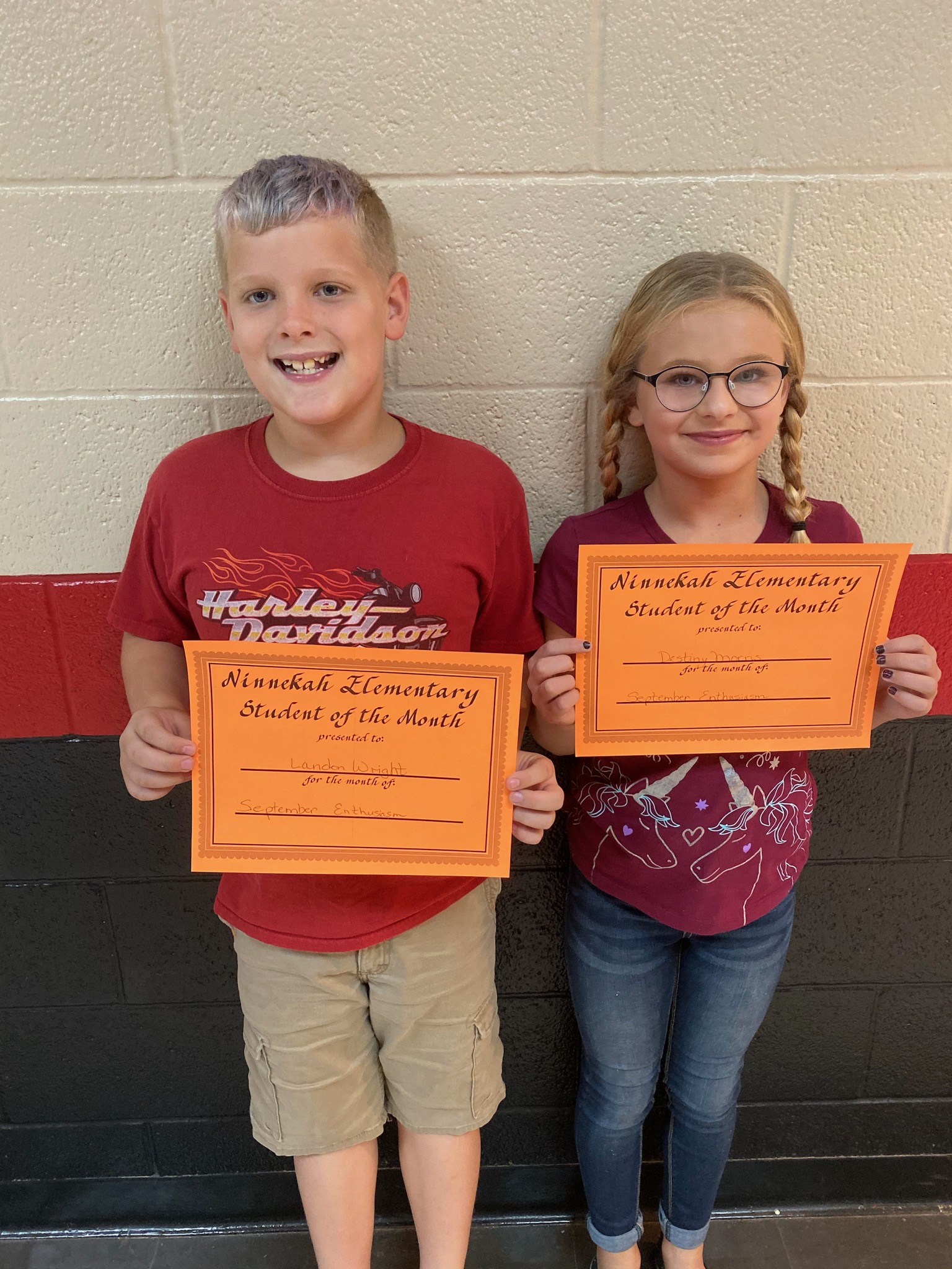 Kids with diplomas