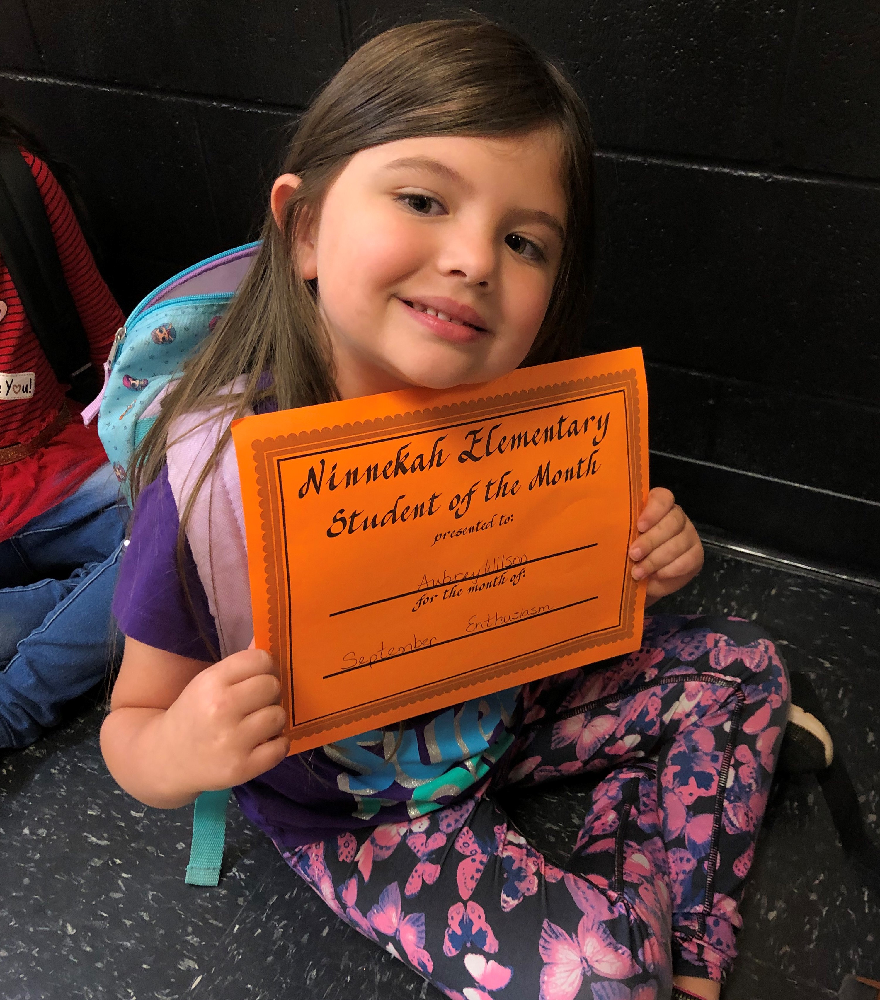 Kid with diploma