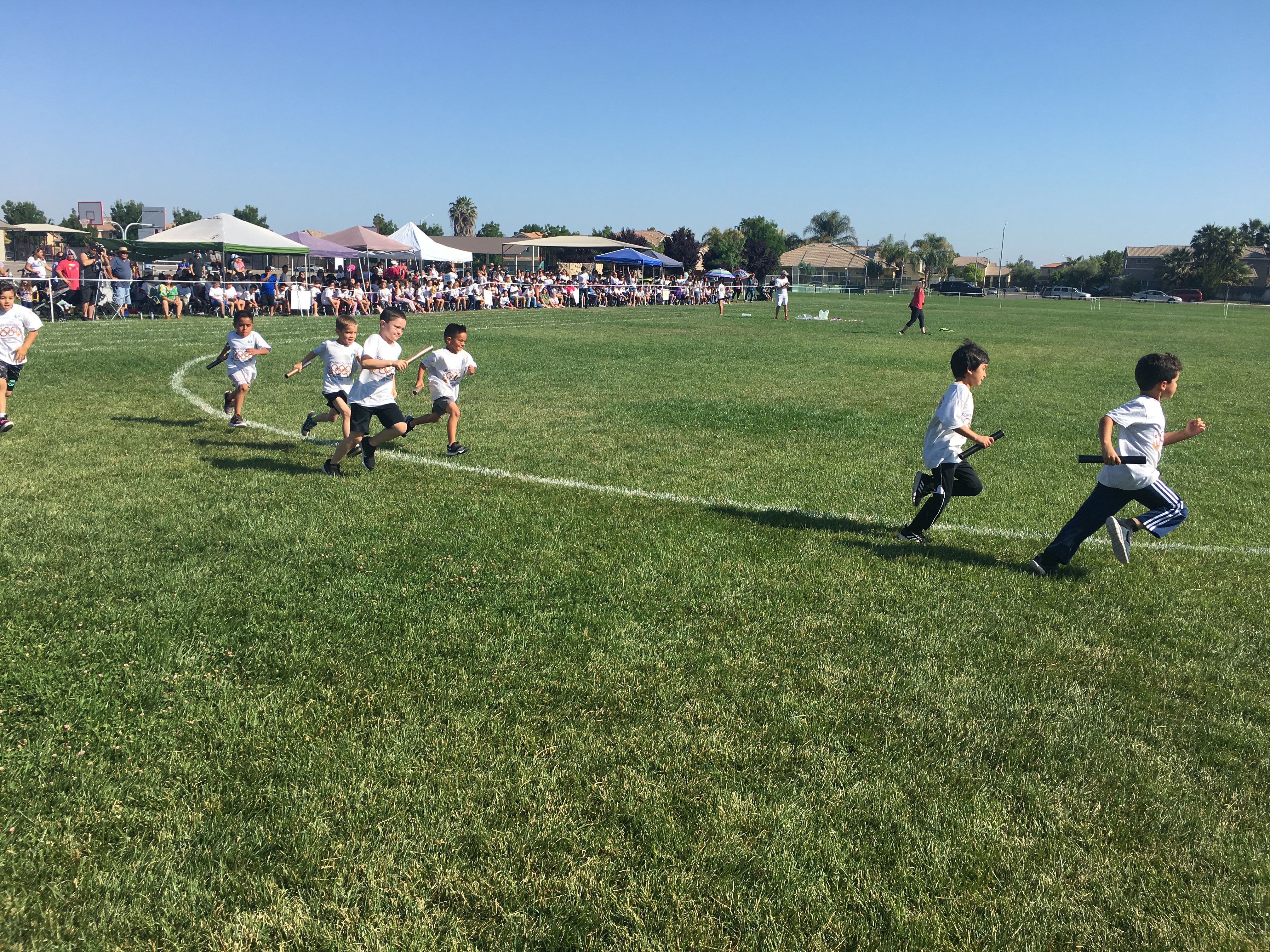 Photos of the School Olympics with the students and teachers participating
