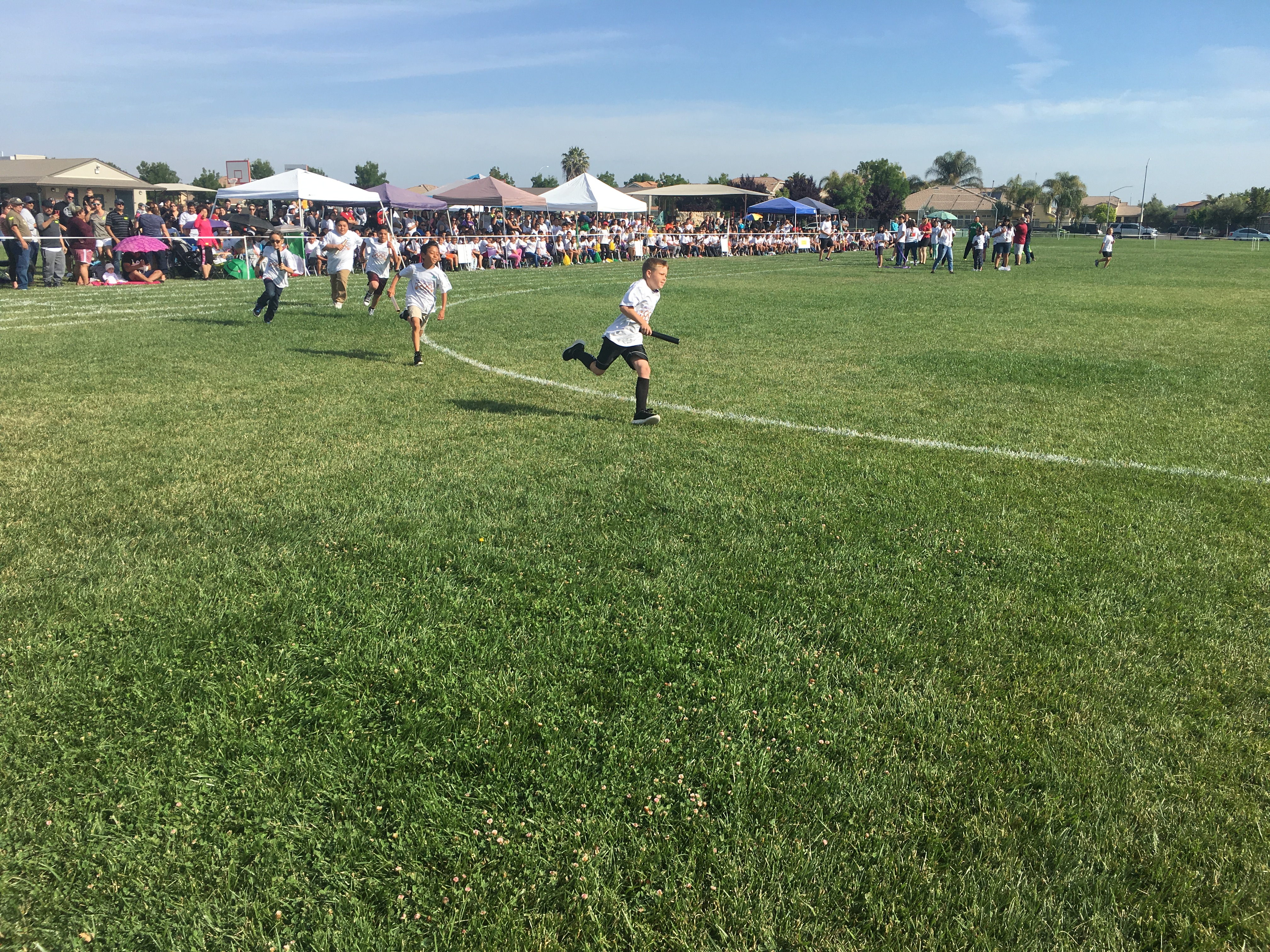Photos of the School Olympics with the students and teachers participating
