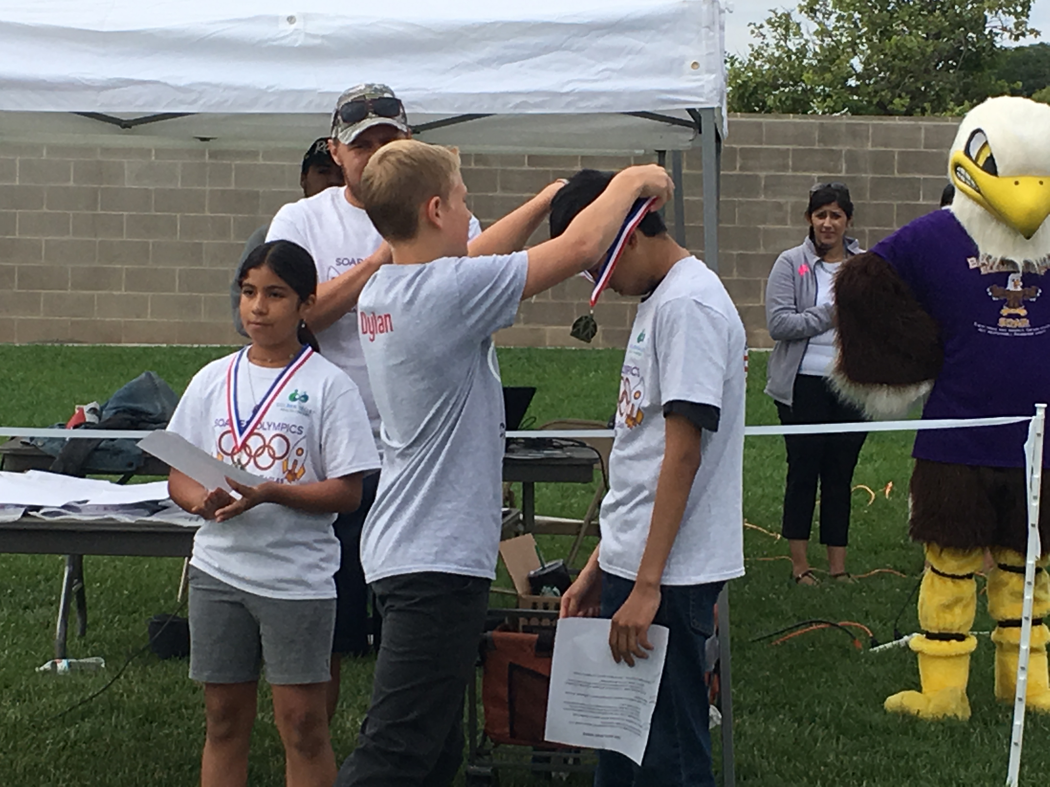 The students all enjoying different activities during their Mini-Olympics