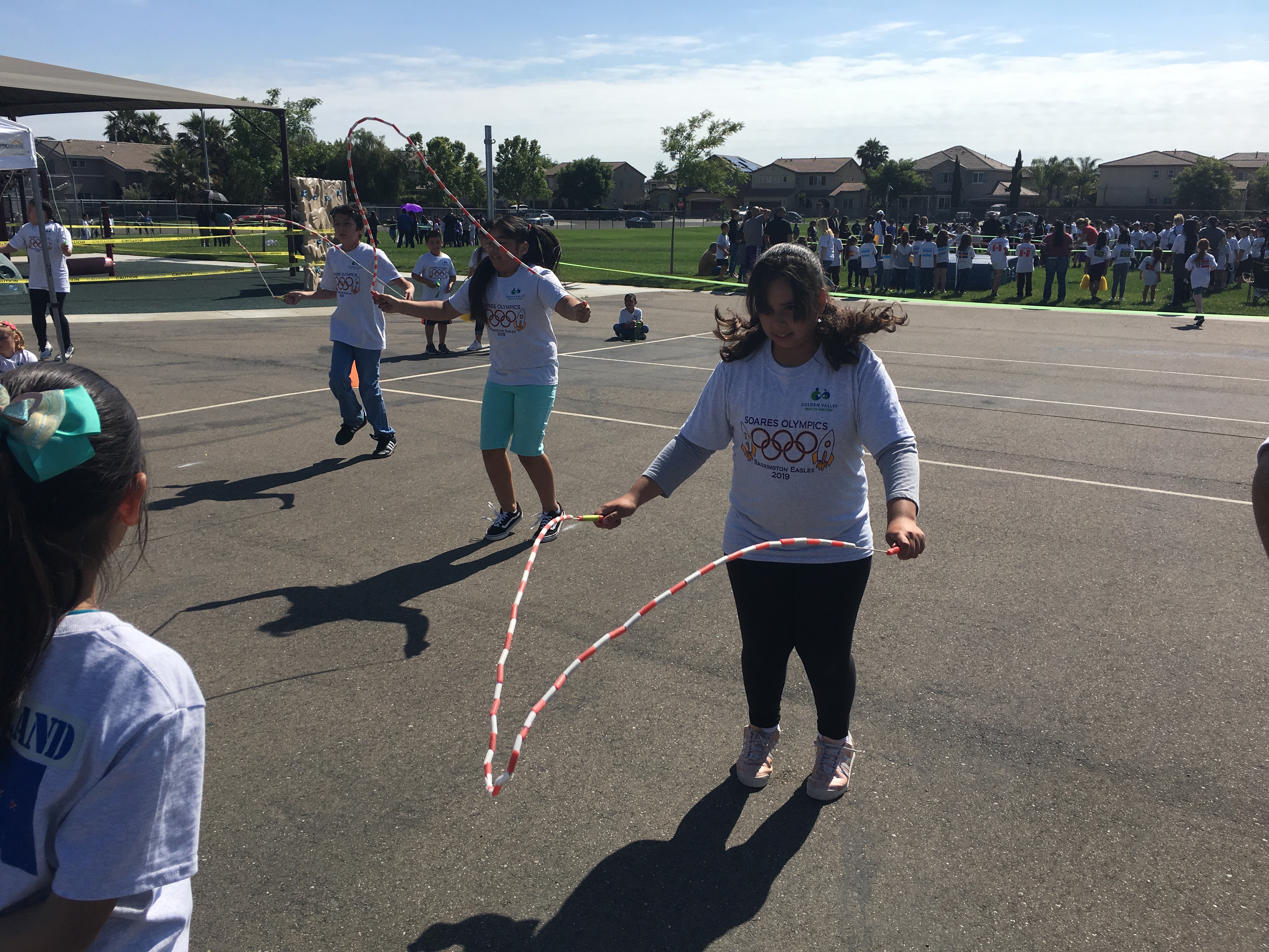 The students all enjoying different activities during their Mini-Olympics