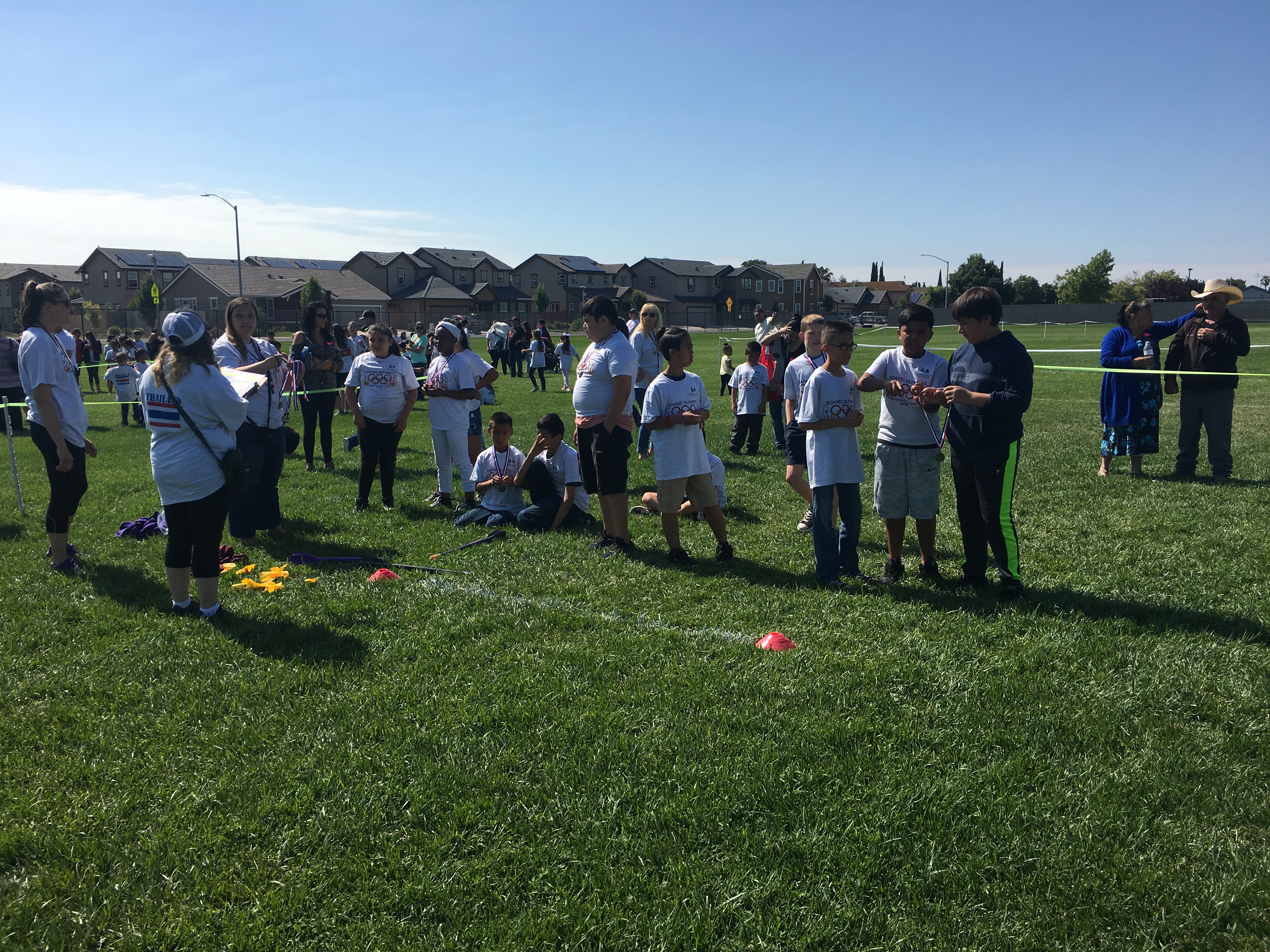 The students all enjoying different activities during their Mini-Olympics