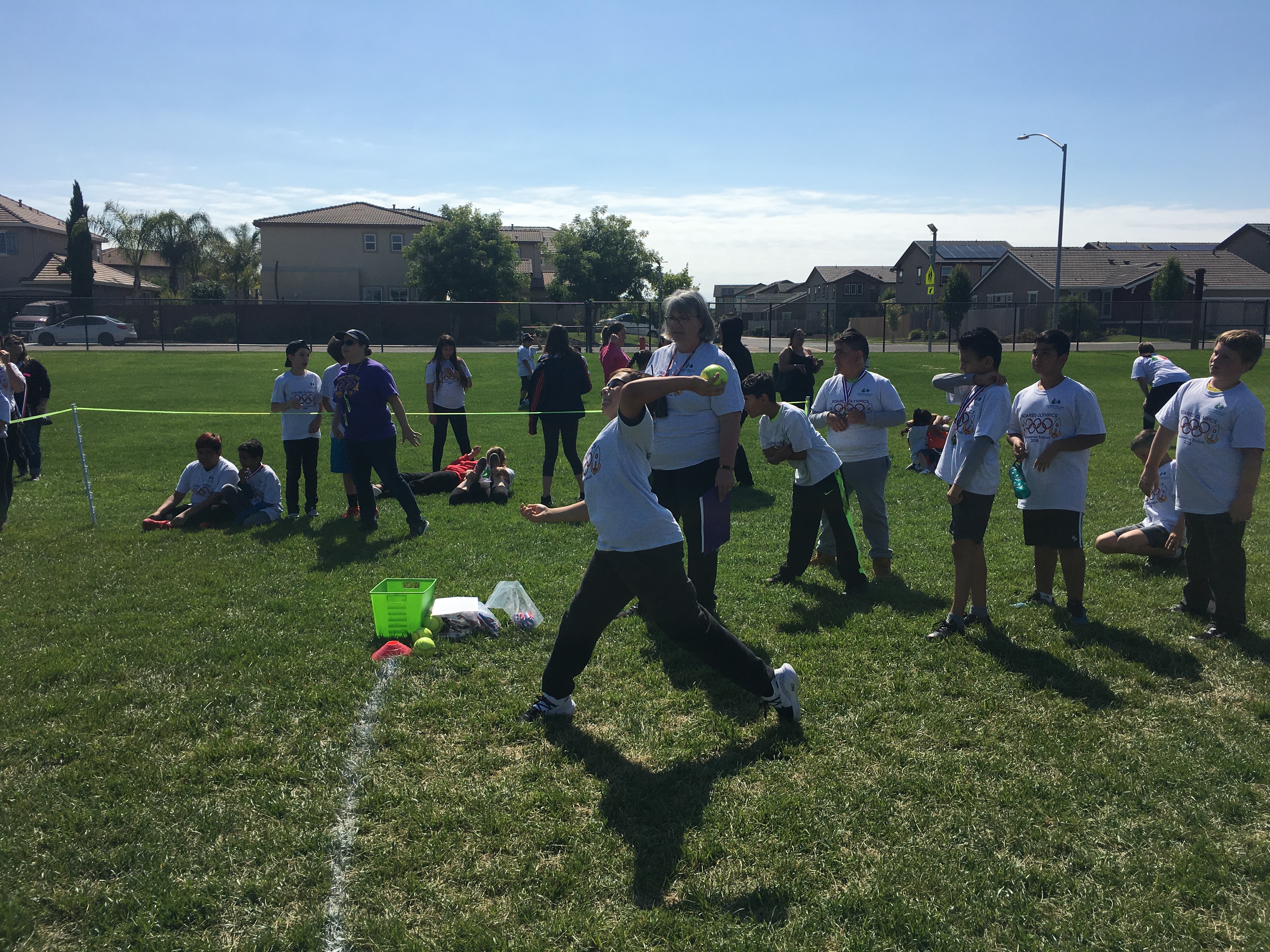 The students all enjoying different activities during their Mini-Olympics