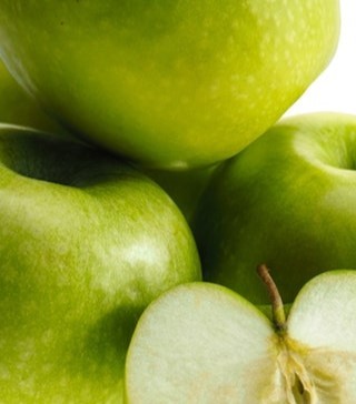 A photo of many green apples.