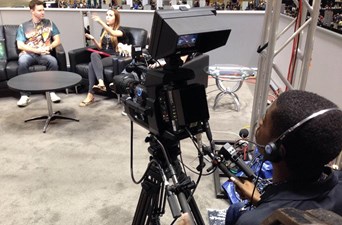 The students working on a live broadcast station