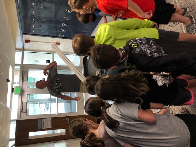 Mr. Wallace teaching physics.