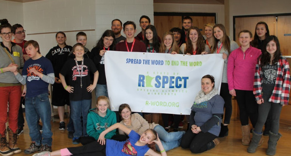 kids holding respect banner