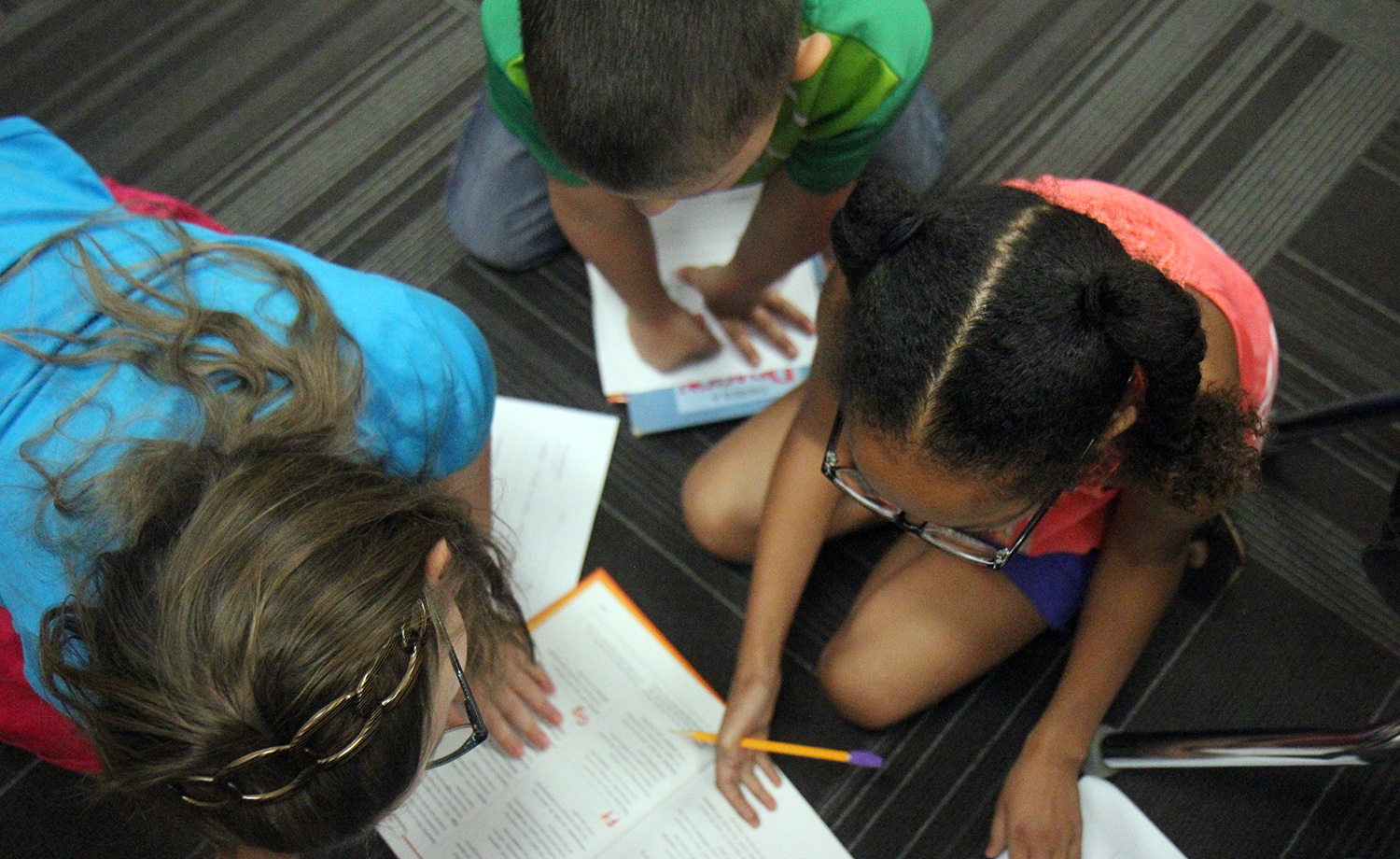 Image of students doing a group project