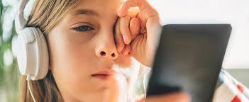 Photo of a girl rubbing her eye