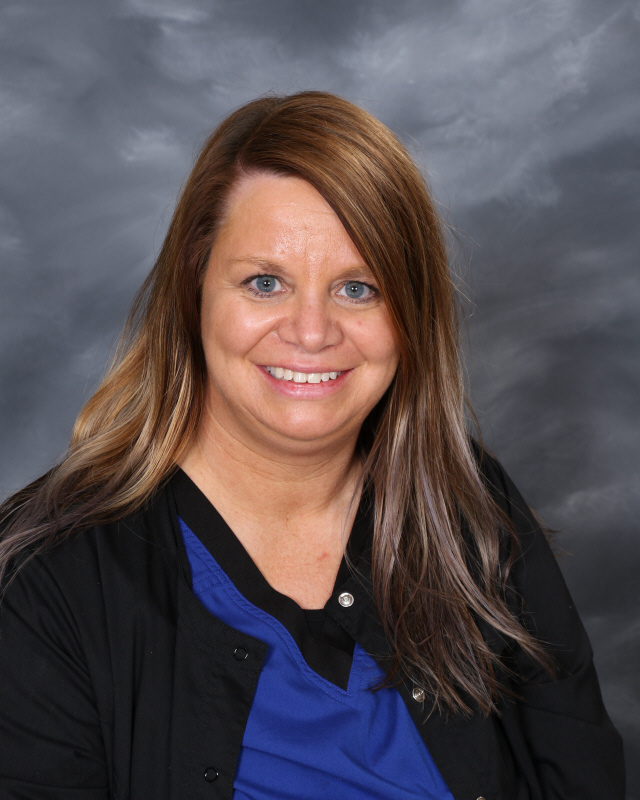 Mrs. Carlson, Nurse Aide