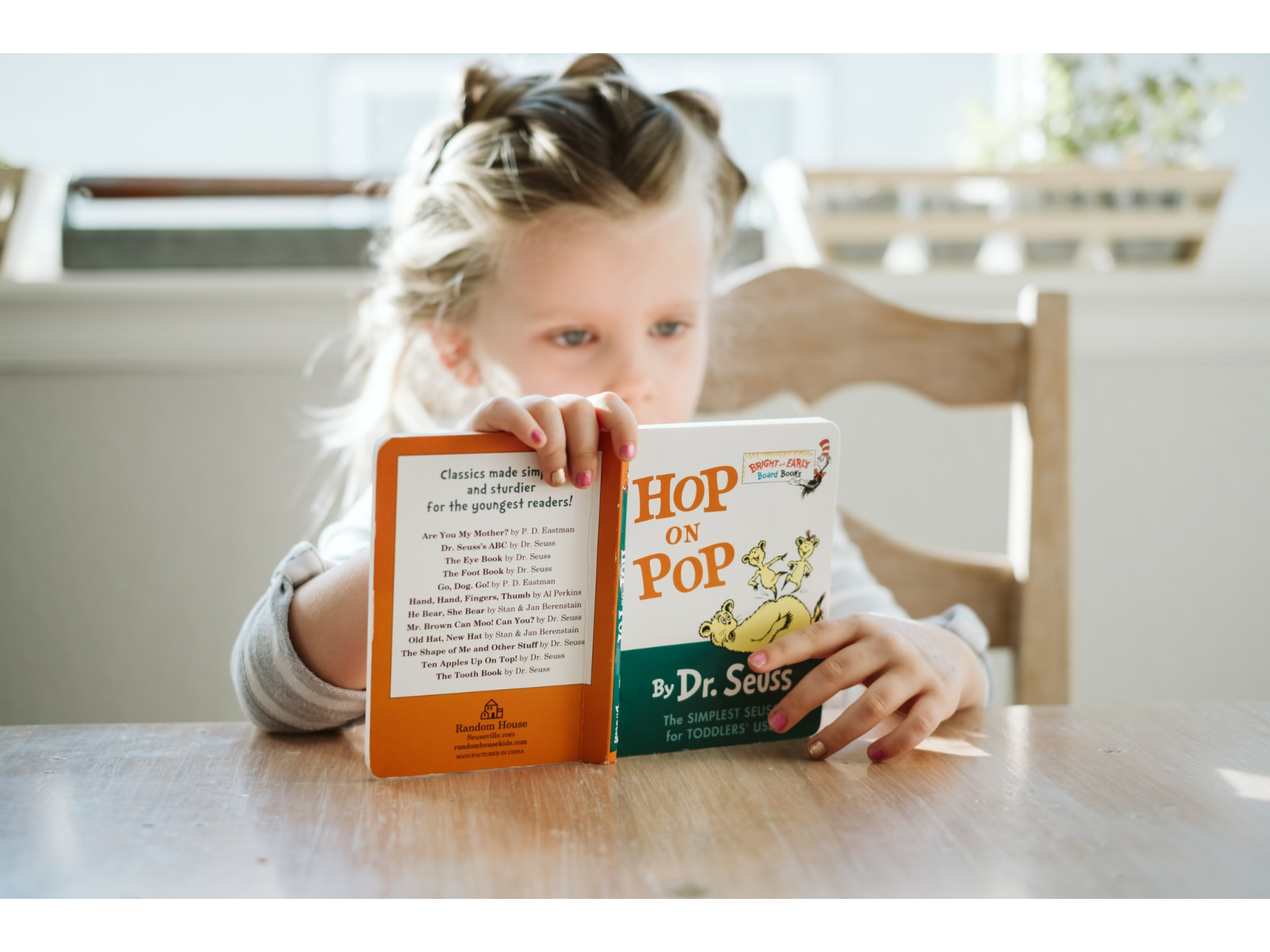 Photo of a girl reading.