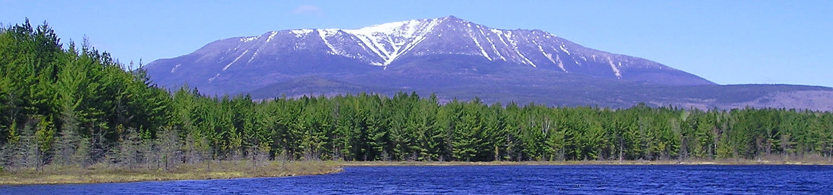 Photo of a lake and a mountain.