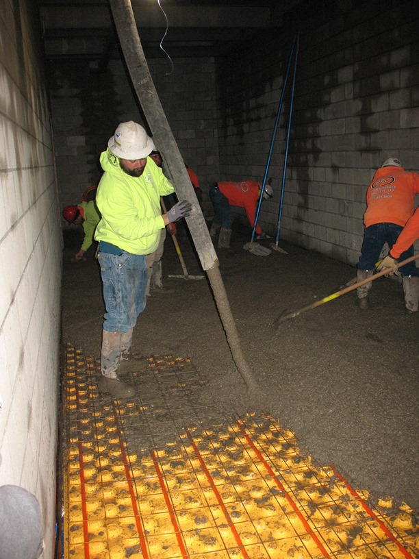 Photo of the radiant heat flooring in the locker rooms.