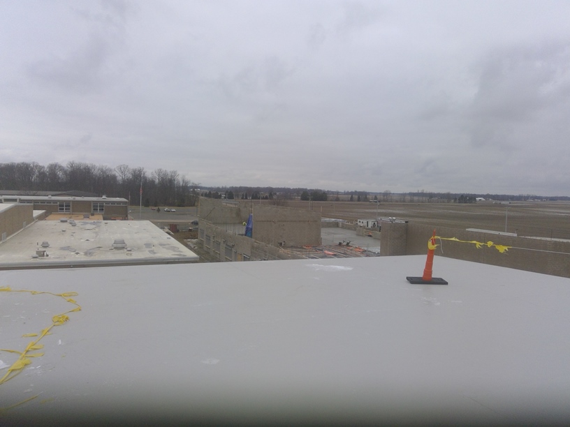 View from the new gym roof looking northeast at the second floor of the academic wing that was just poured