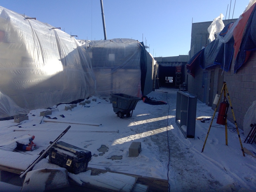 Photo of Tented scaffolding for building interior load-bearing walls.