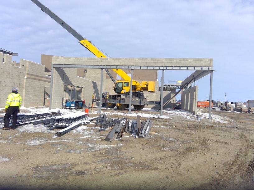 Photo of the setting steel in the cafeteria from inside the principal's office.