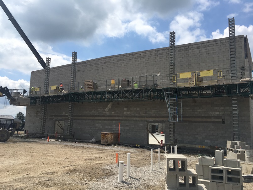 Photo of the East wall of the new gym entering from future cafeteria.