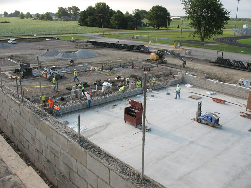 Photo of the Bricklayers building the east gym wall.