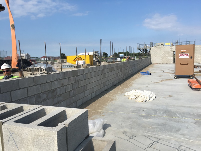 Photo of the South gym wall going up.