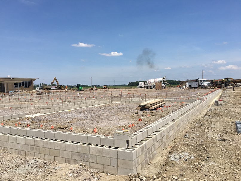 Photo of the Foundation for new gym, band room, locker rooms, and cafeteria.