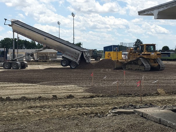 Photo of the foundation for the new school gym.