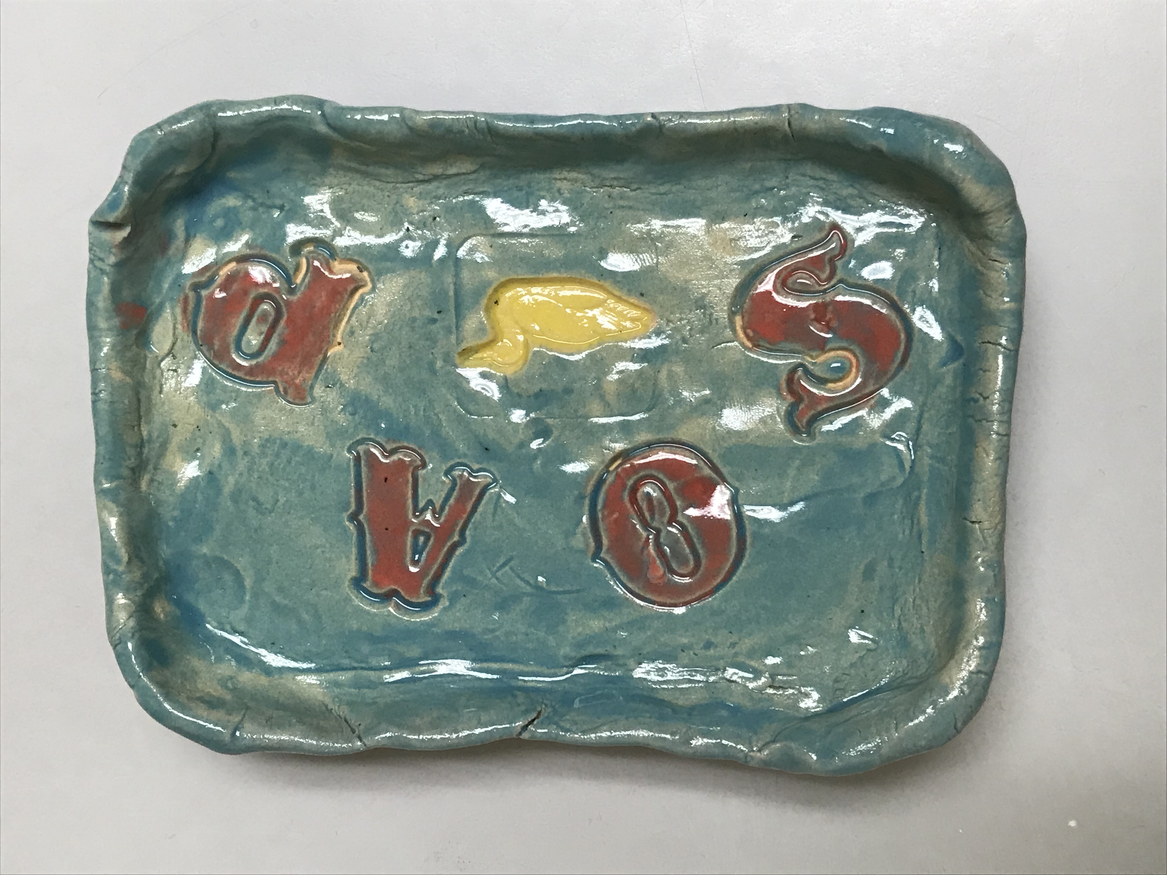 Students working on ceramic ornaments.