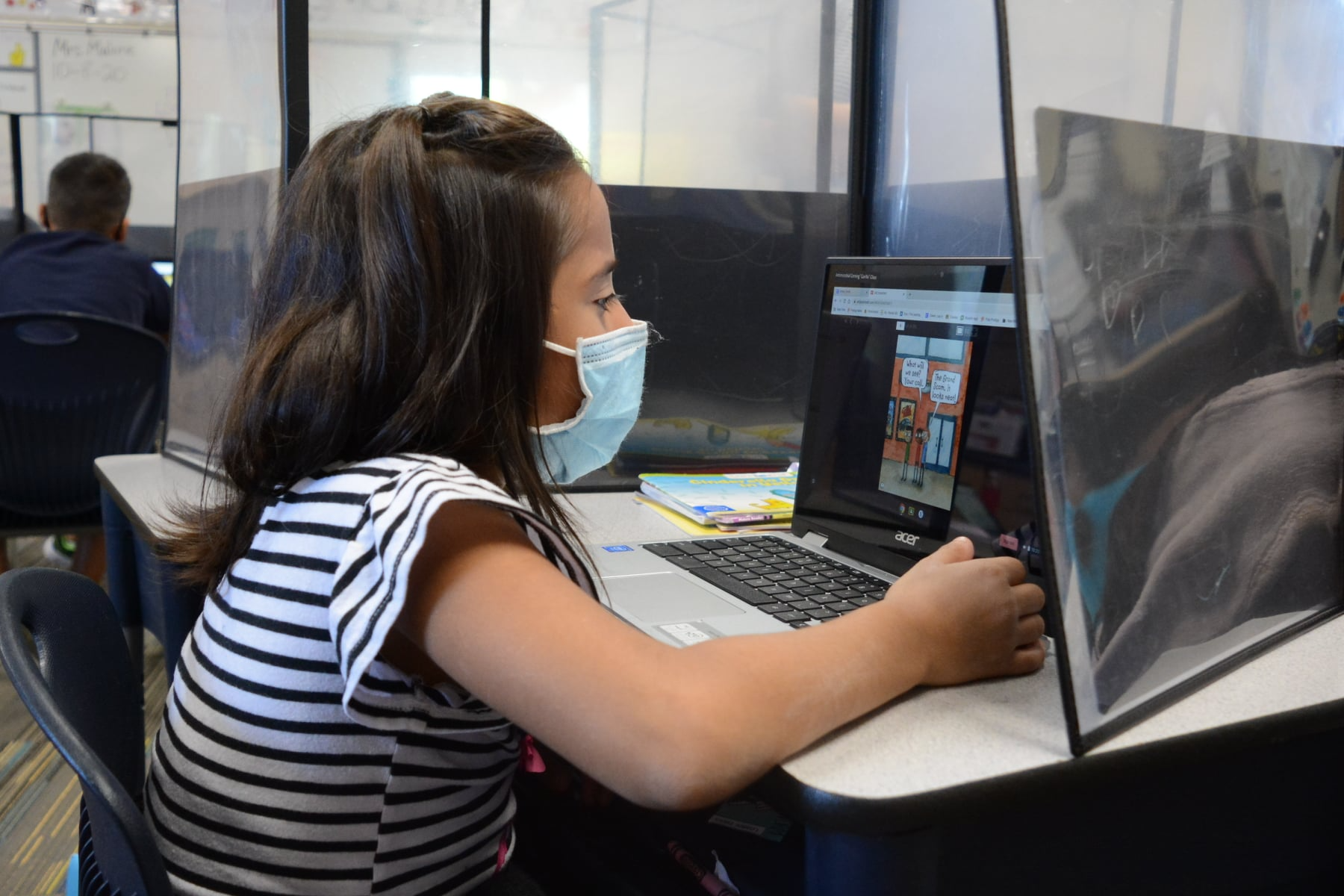 young girl on laptop computer