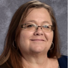 a photo of food services director, accounts payable, and procurement, Margie Poppin