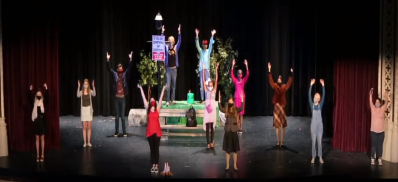 Picture of student on stage performing Pandora's Backpack