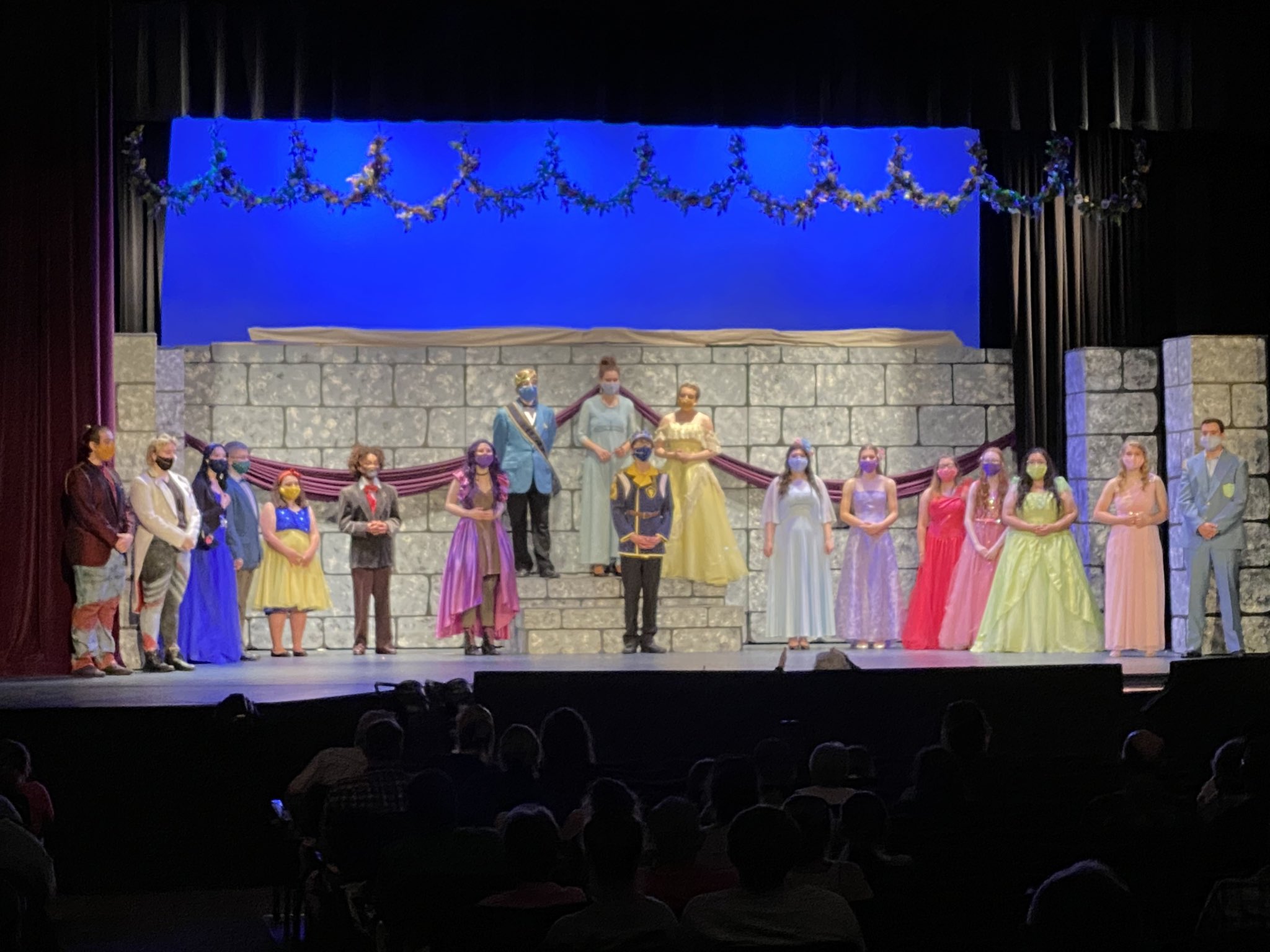 Photo of students on stage in costume