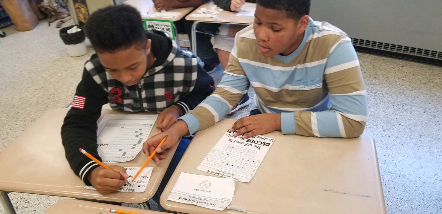 photo of 7th graders working on a project
