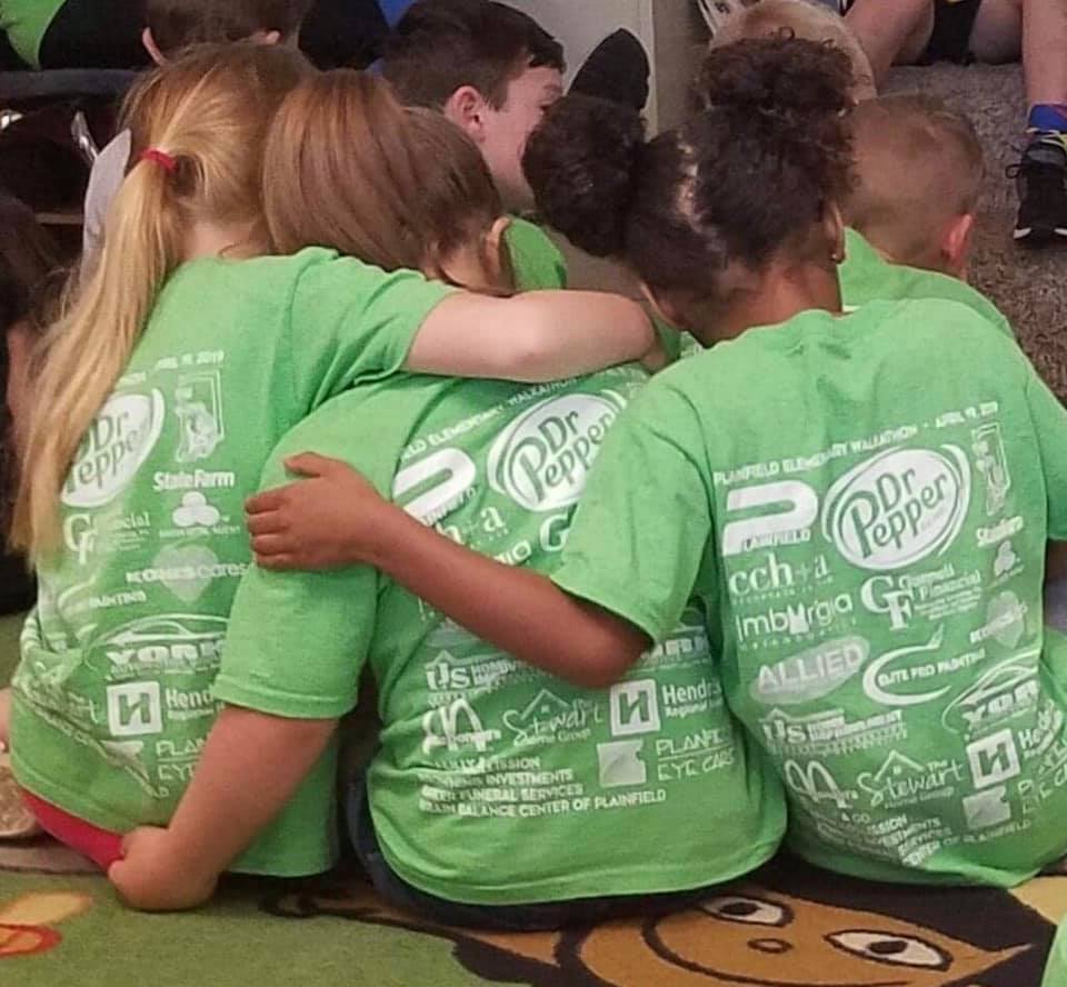 photo of students hugging
