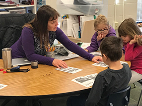 Teacher educating her students