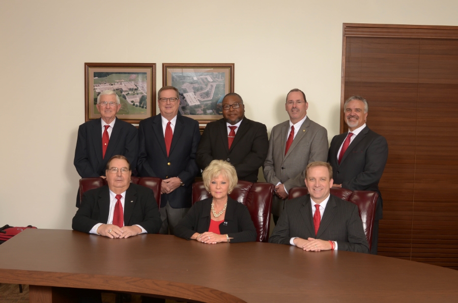 Pictured back left to right: Truman Shirey, Frank Willis, Elzie Hicks, Ben Donald, Paul Beatty Front left to right: Ken Andrus, Mary Ella Sherman, John Wink