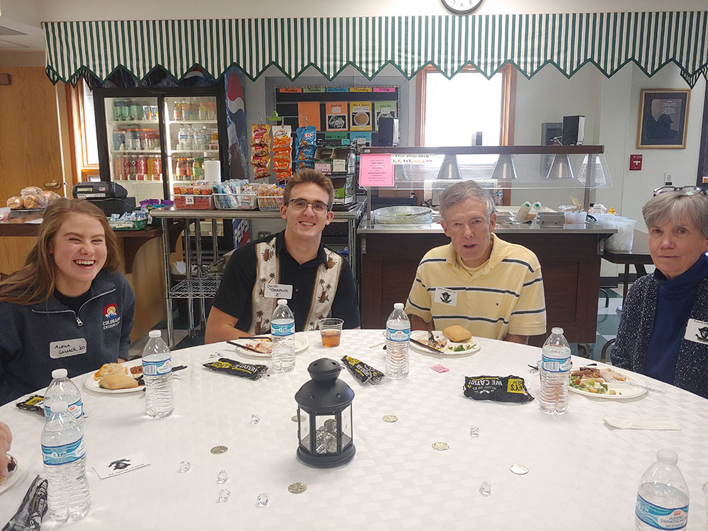 alumni eating together