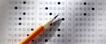 pencil placed over a scantron that is filled out