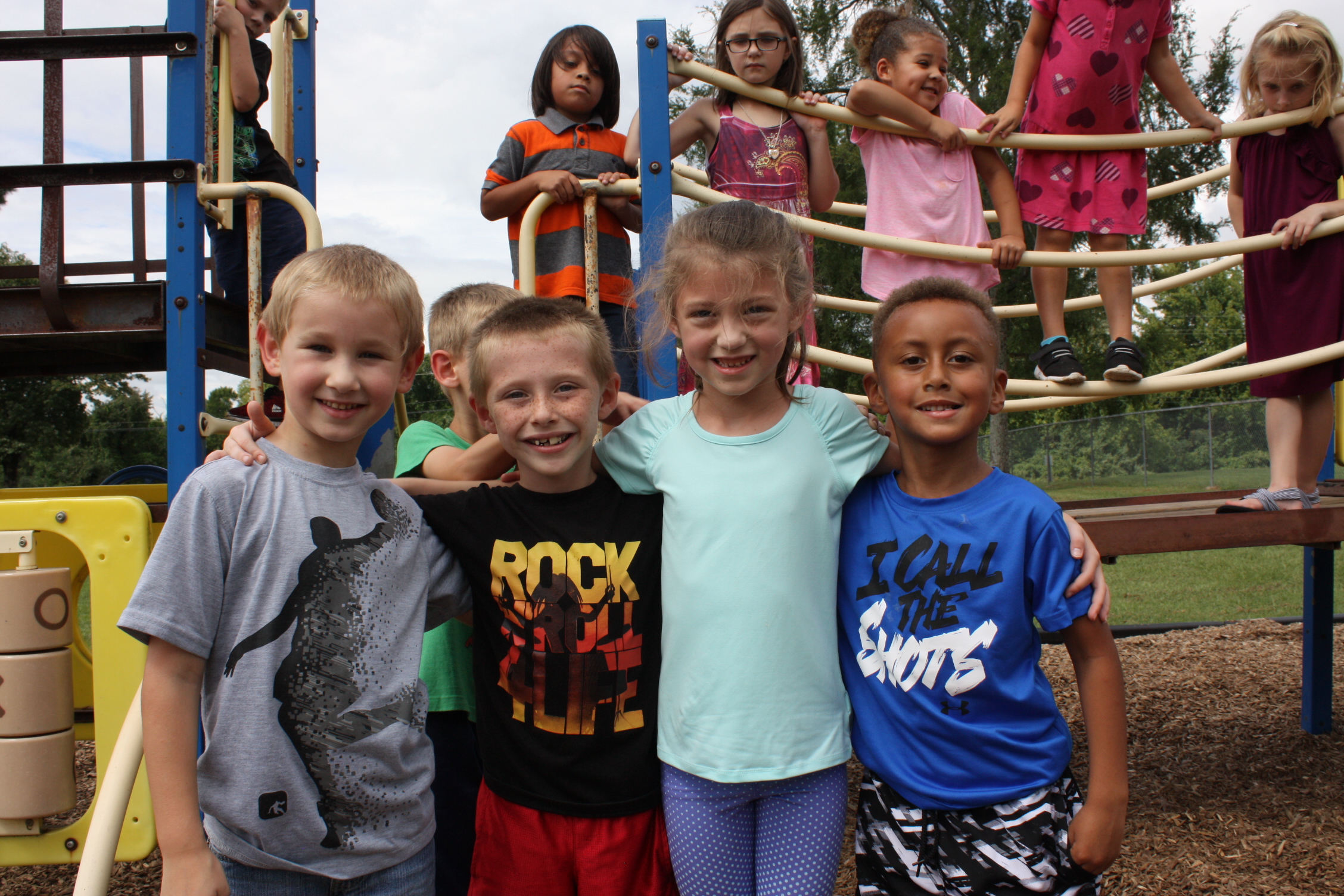 A group of students all playing in the school's playground