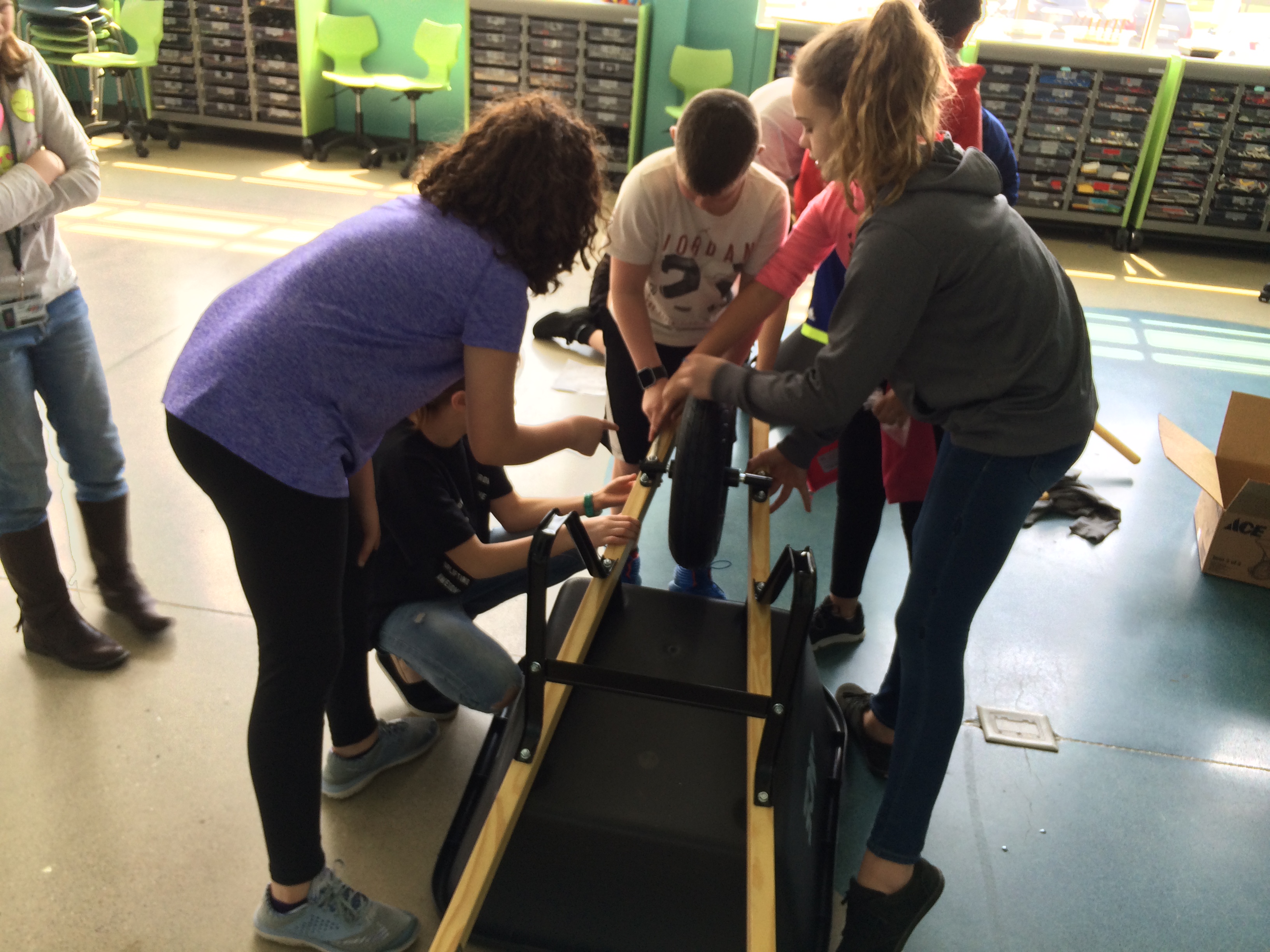STEM Washington Academy, students doing various activities indoors and outdoors