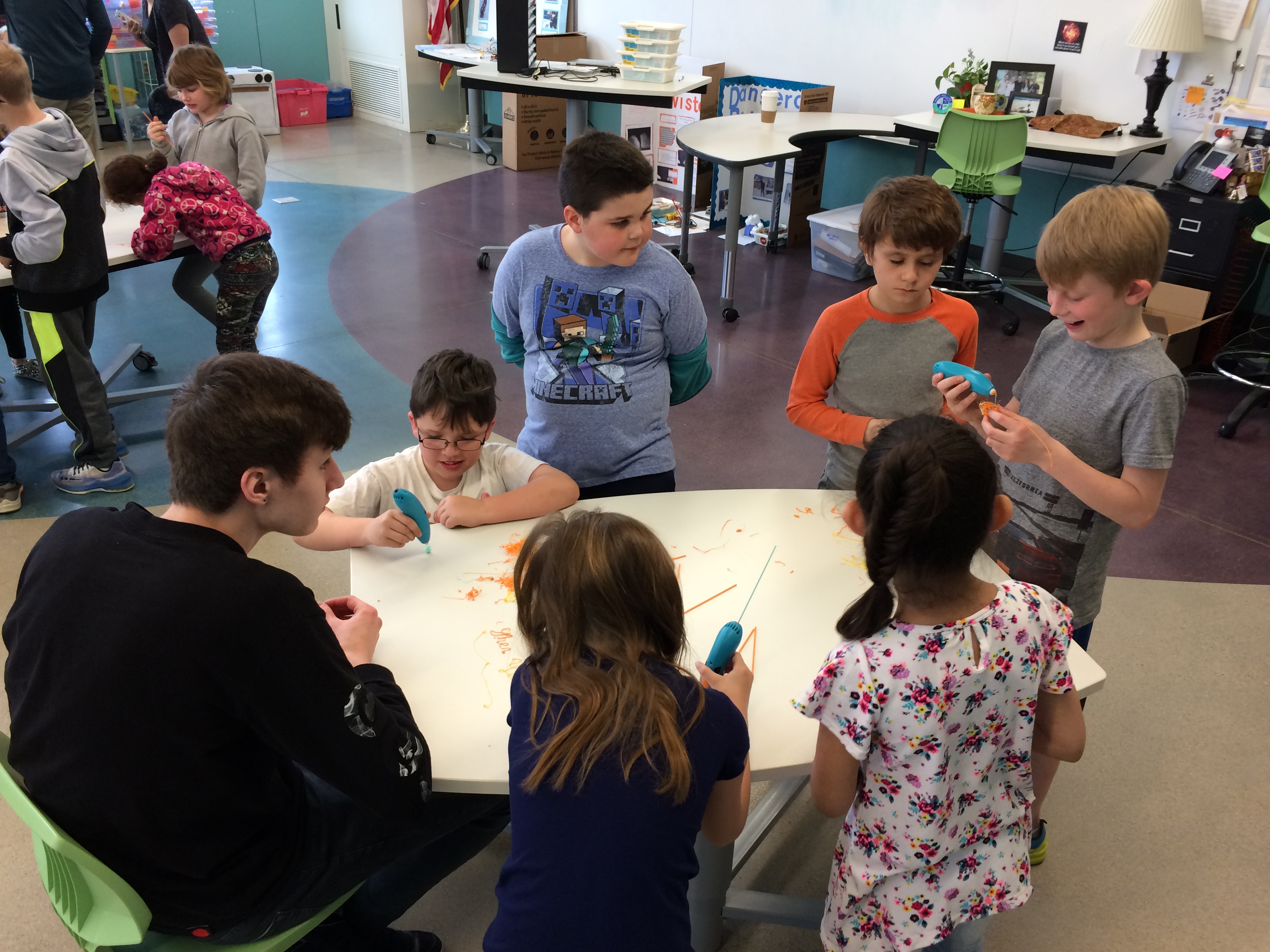 STEM Washington Academy, students doing various activities indoors and outdoors