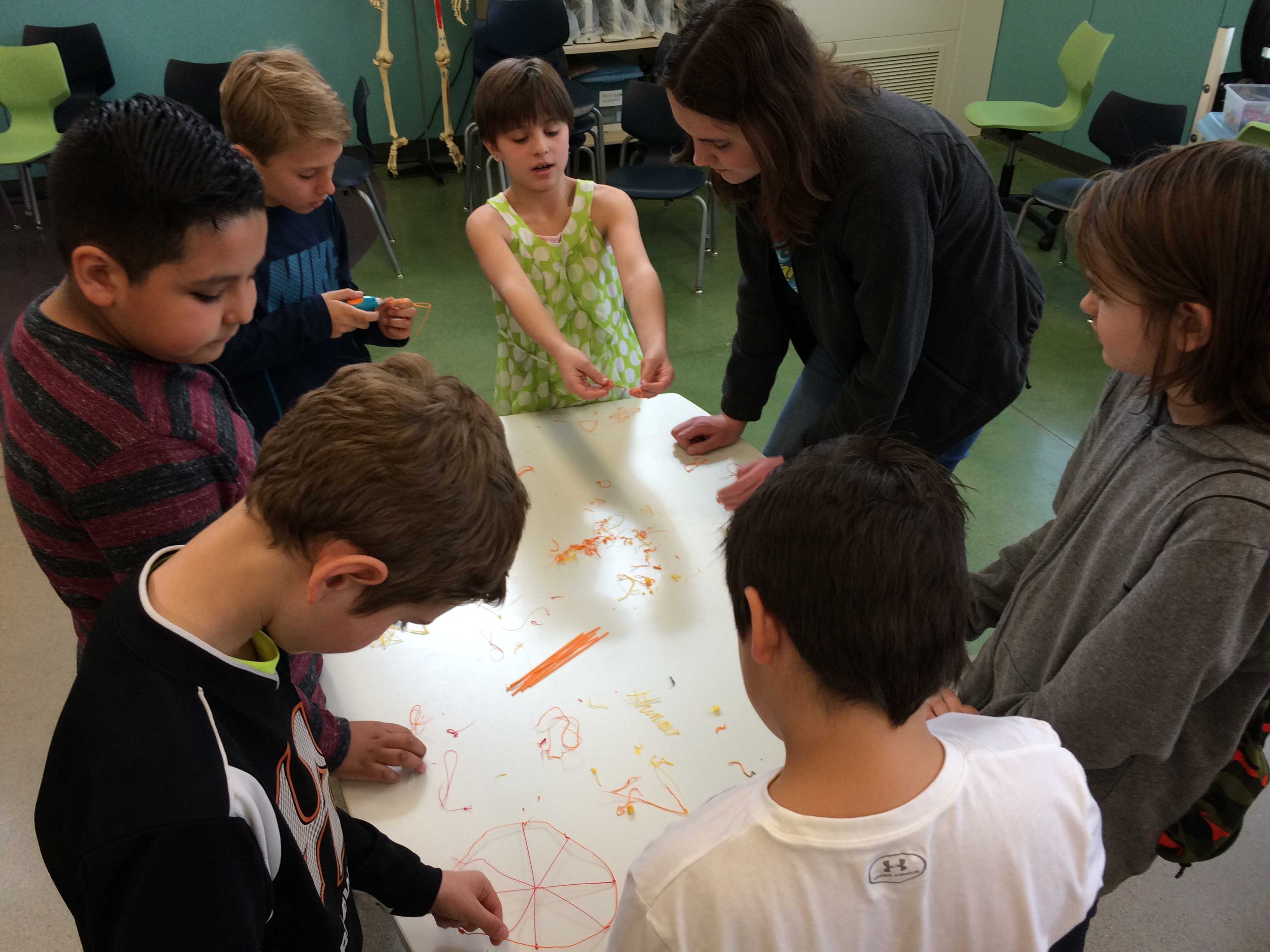 STEM Washington Academy, students doing various activities indoors and outdoors