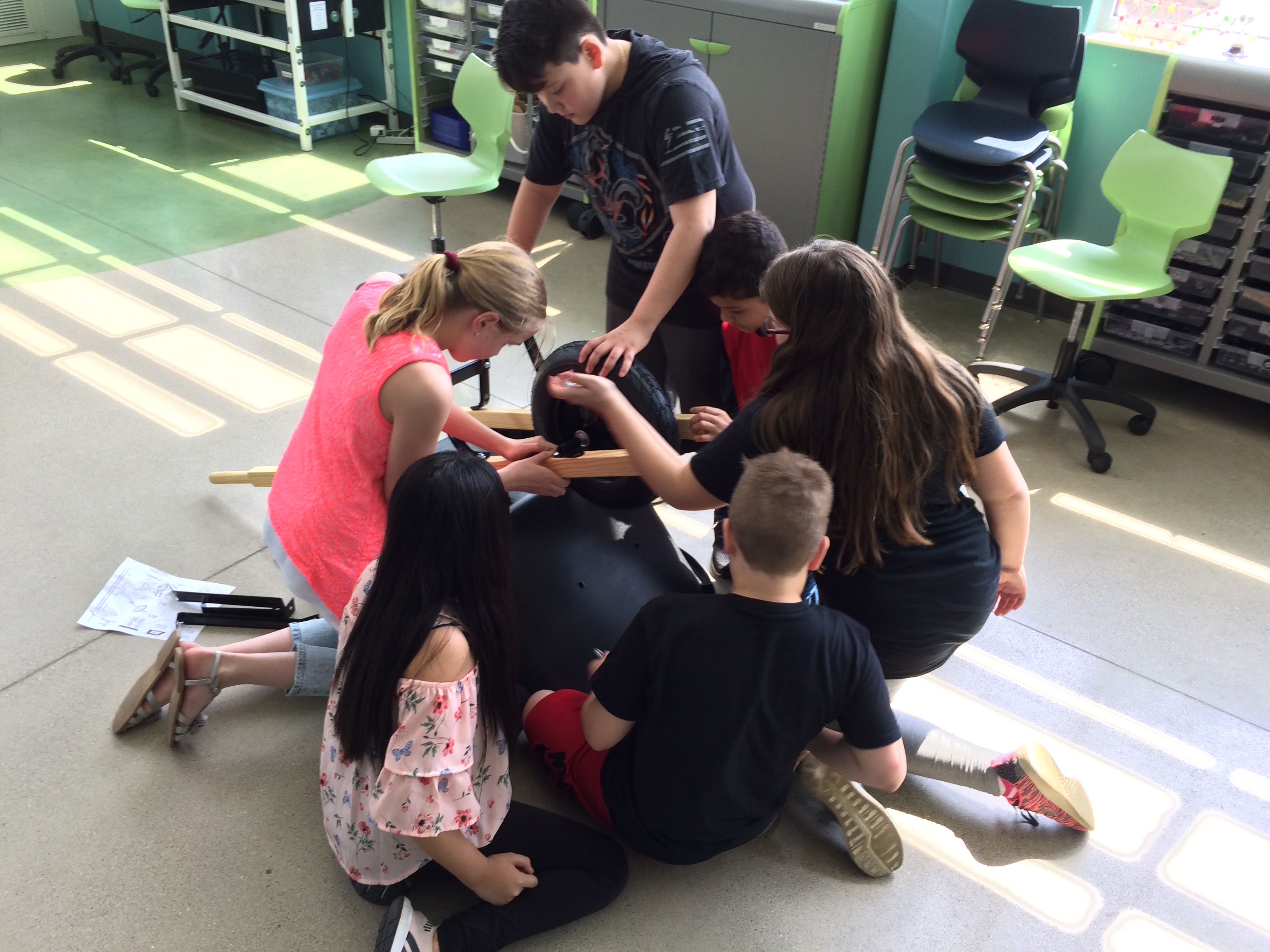 STEM Washington Academy, students doing various activities indoors and outdoors