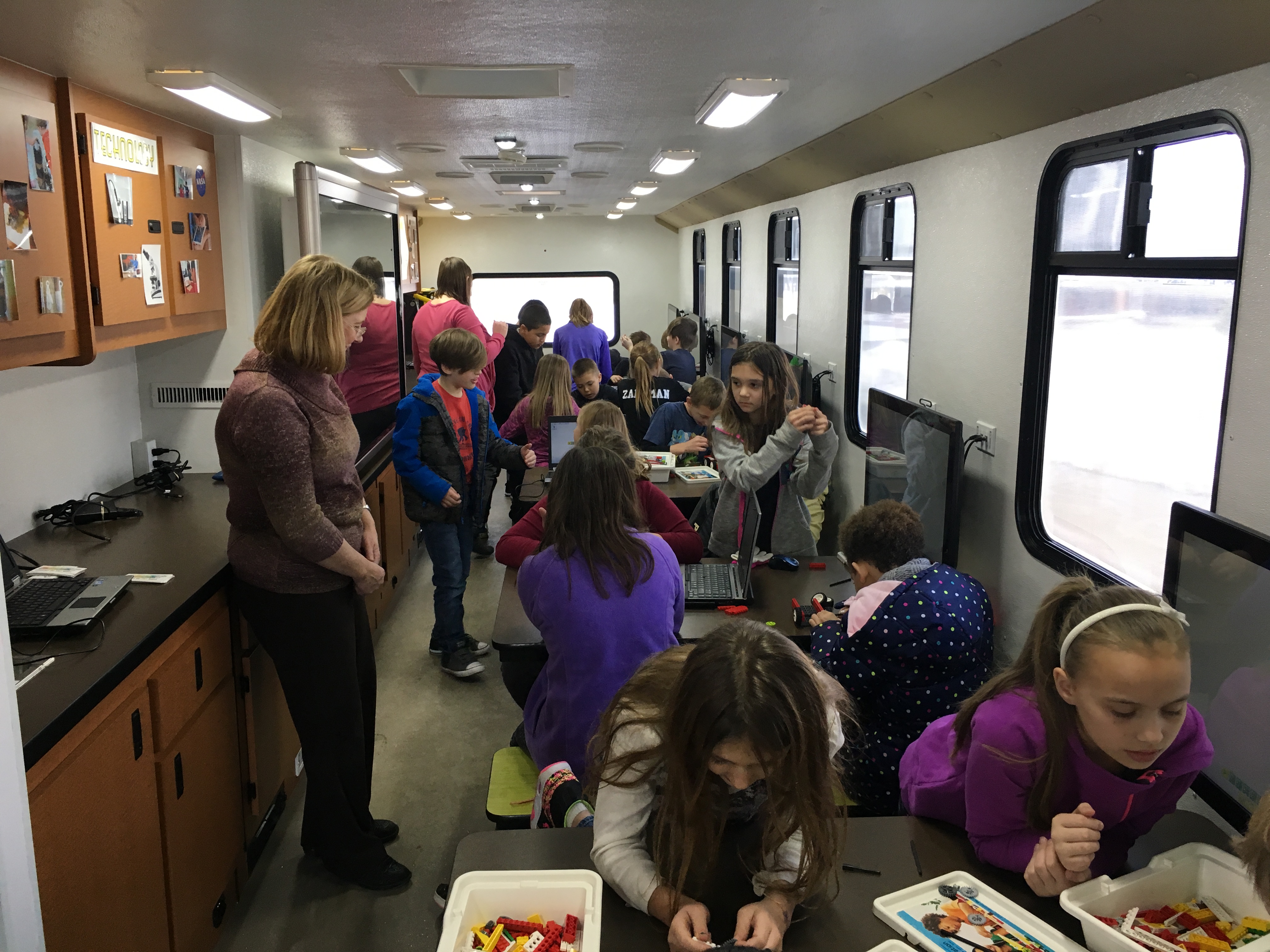 STEM Washington Academy, students doing various activities indoors and outdoors